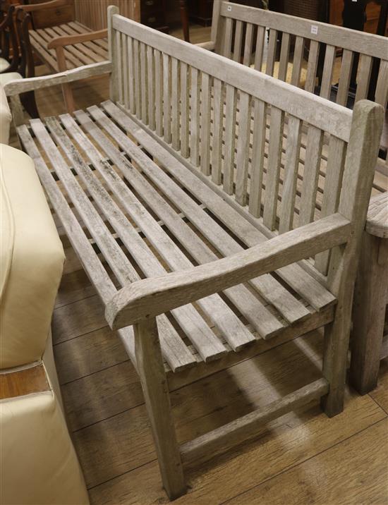 A teak garden bench, W.180cm